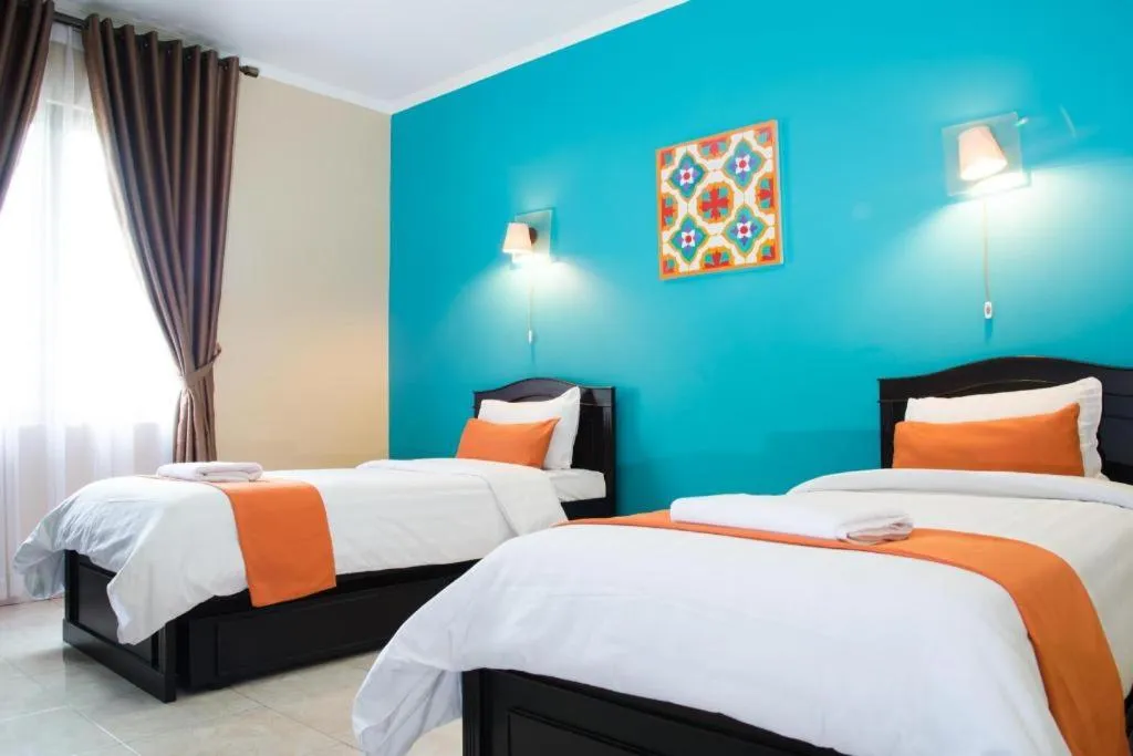 Bed in Ole Suite Hotel