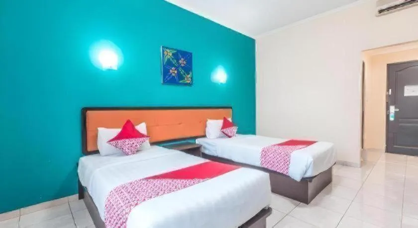 Bed in Ole Suite Hotel