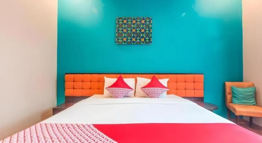 Bed in Ole Suite Hotel