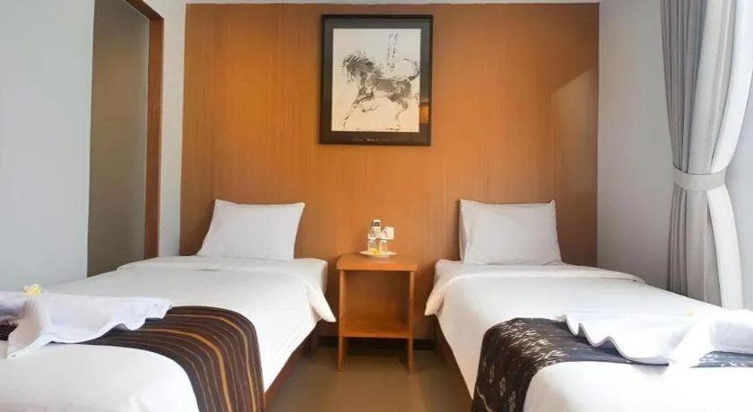 Bed in Hadi Poetra Hotel