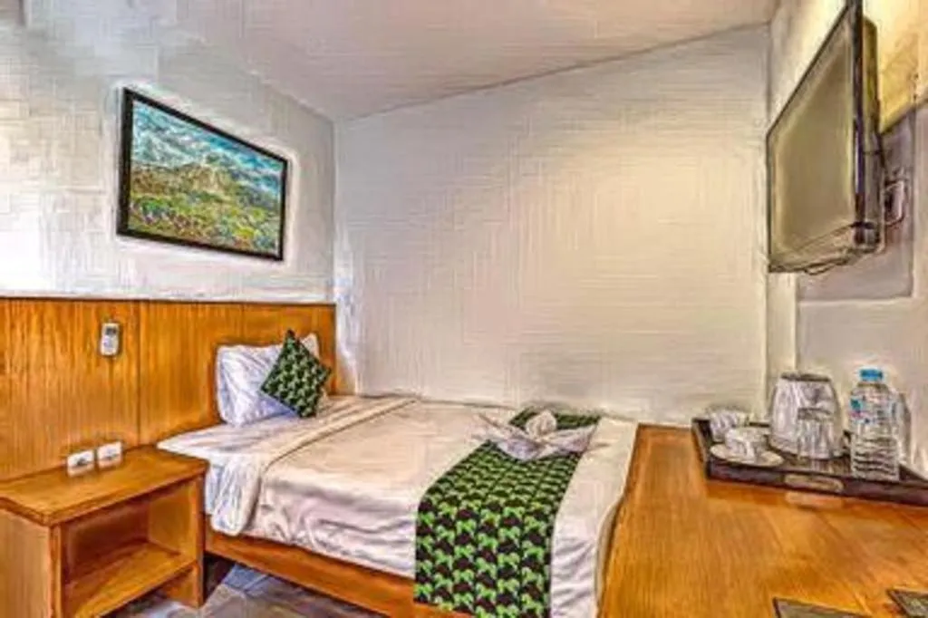 Bed in Hadi Poetra Hotel