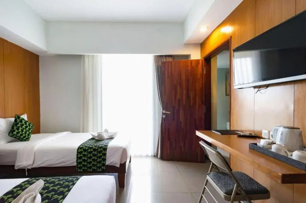 Bed in Hadi Poetra Hotel Bed in Hadi Poetra Hotel