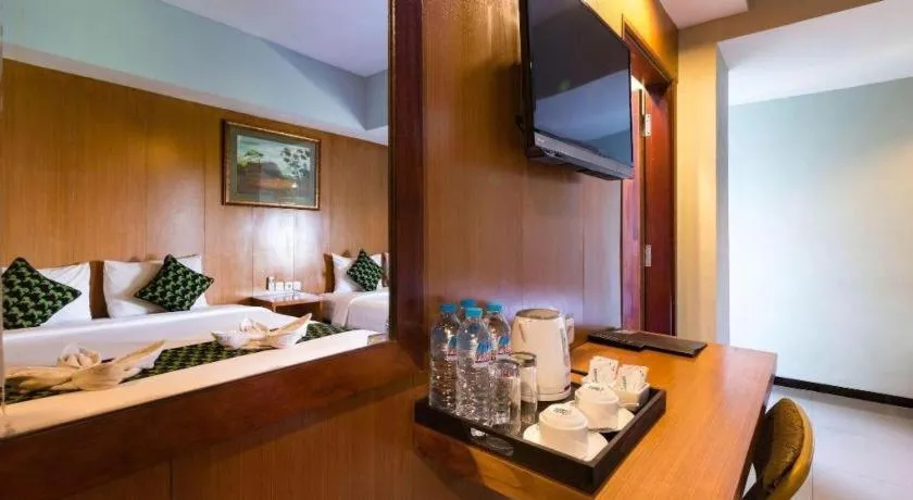 Bed in Hadi Poetra Hotel