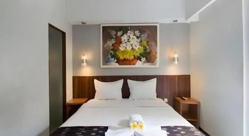 Bed in Hadi Poetra Hotel Bed in Hadi Poetra Hotel