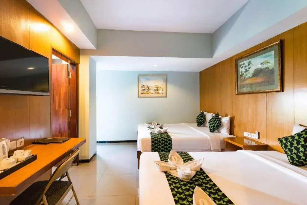 Bed in Hadi Poetra Hotel Bed in Hadi Poetra Hotel