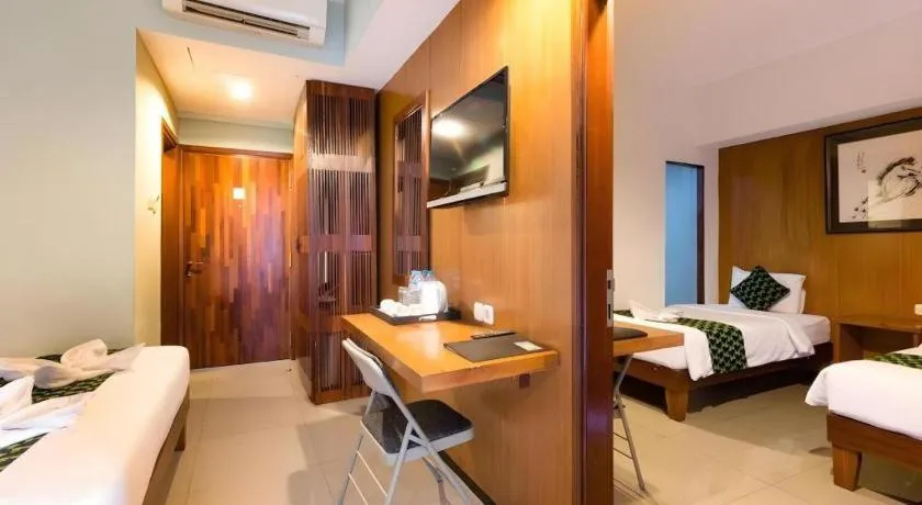 Bed in Hadi Poetra Hotel