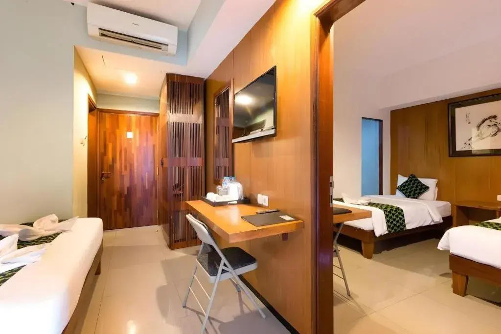 Bed in Hadi Poetra Hotel Bed in Hadi Poetra Hotel