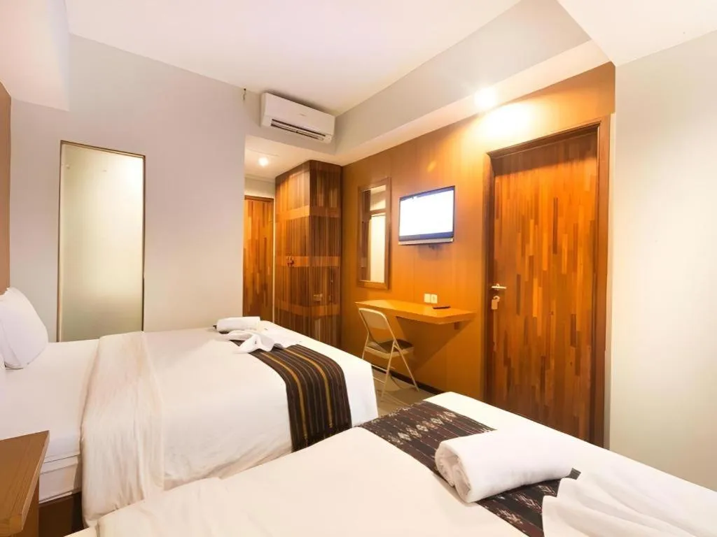 Bed in Hadi Poetra Hotel