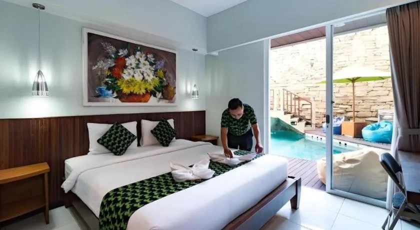 Bed in Hadi Poetra Hotel