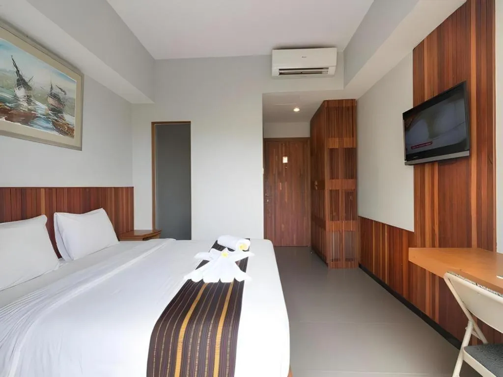 Bed in Hadi Poetra Hotel