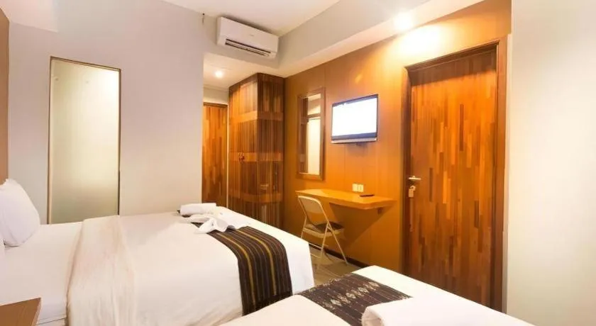 Bed in Hadi Poetra Hotel