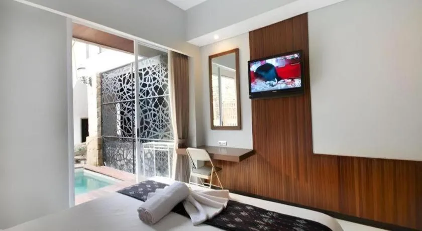 Bed in Hadi Poetra Hotel