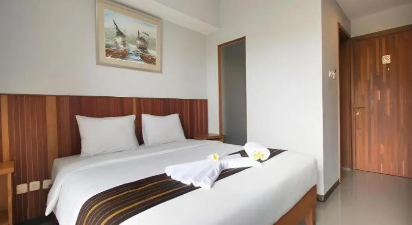 Bed in Hadi Poetra Hotel