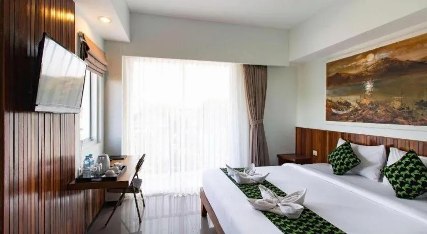 Bed in Hadi Poetra Hotel