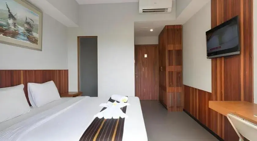 Bed in Hadi Poetra Hotel Bed in Hadi Poetra Hotel