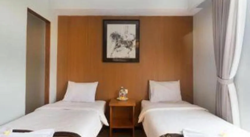 Bed in Hadi Poetra Hotel