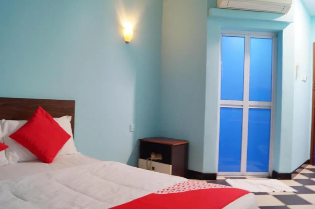 Bed in BudgetOne Hotel