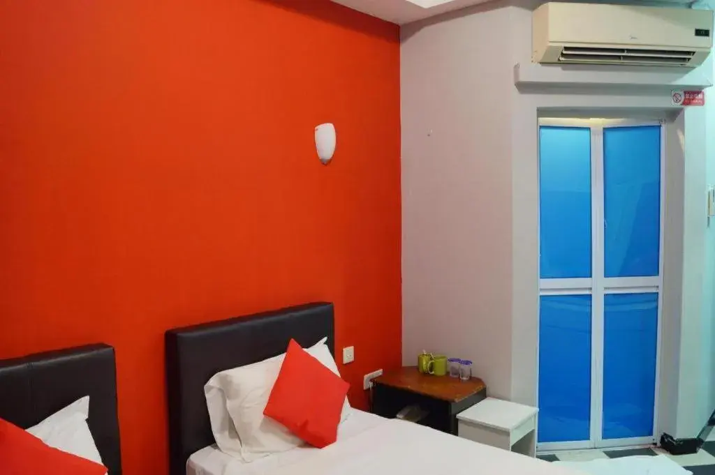 Bed in BudgetOne Hotel Bed in BudgetOne Hotel