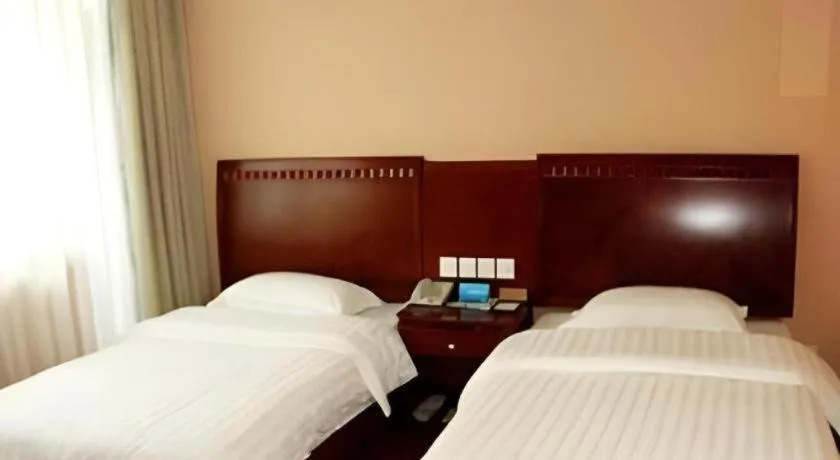 Bed in Chongqing Tianyou Hotel