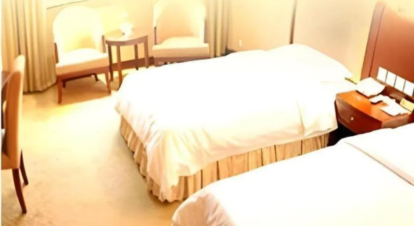 Bed in Chongqing Tianyou Hotel