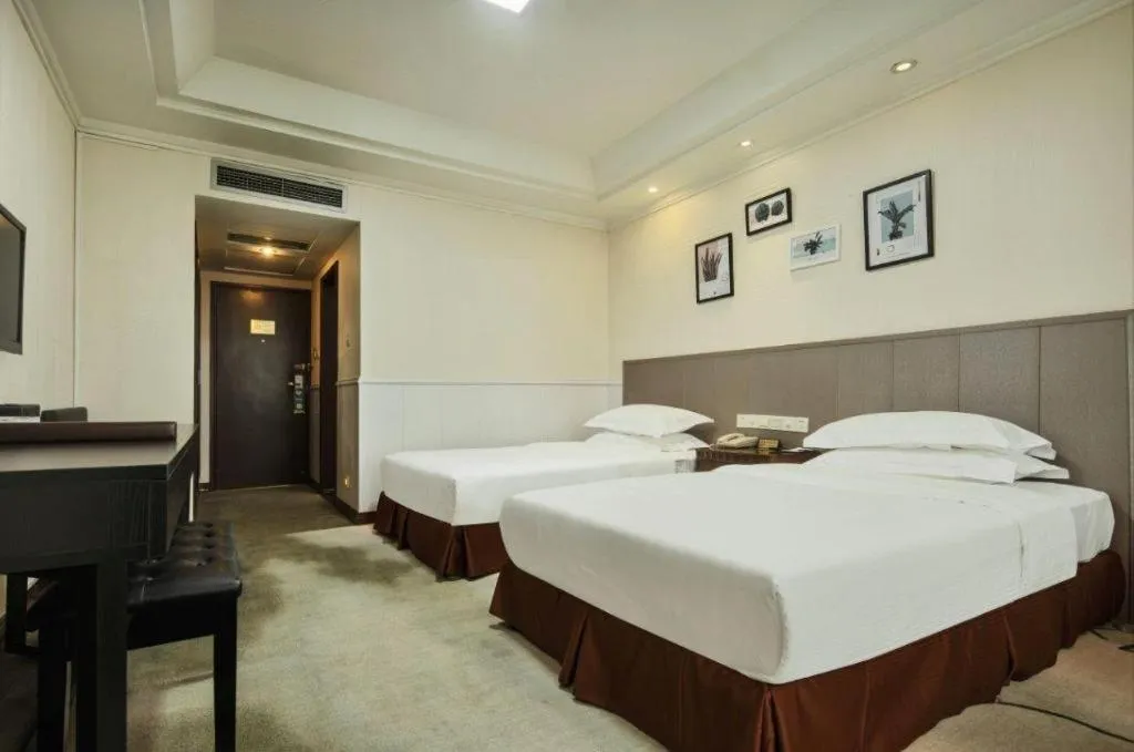 Bed in Chongqing Tianyou Hotel