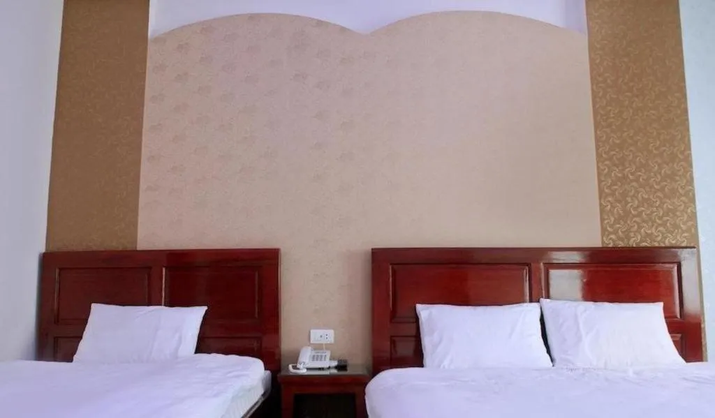 Bed in Ngoc Bach Hotel