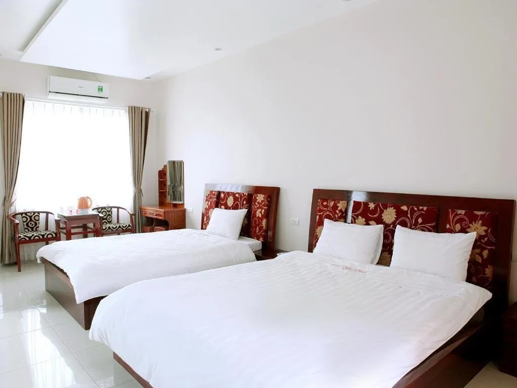 Bed in Ngoc Bach Hotel