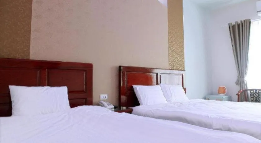 Bed in Ngoc Bach Hotel