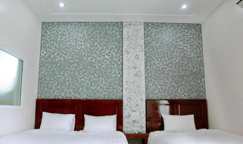 Bed in Ngoc Bach Hotel