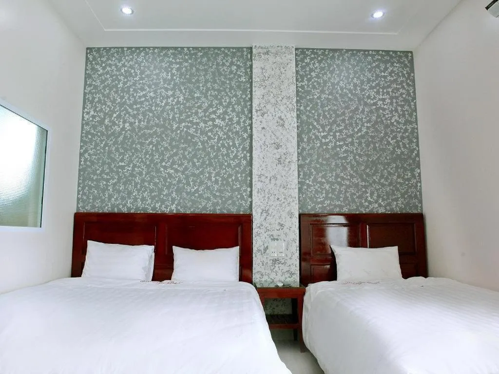 Bed in Ngoc Bach Hotel