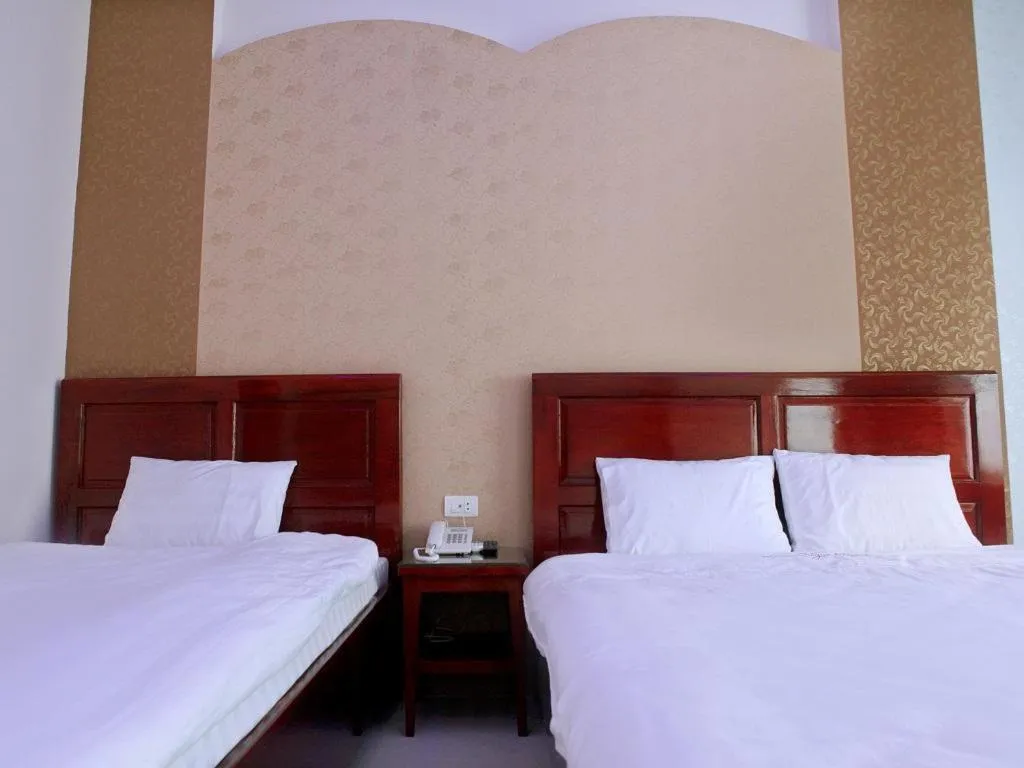 Bed in Ngoc Bach Hotel