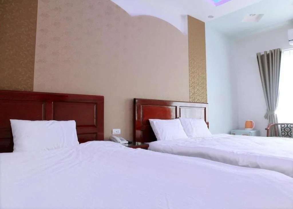 Bed in Ngoc Bach Hotel