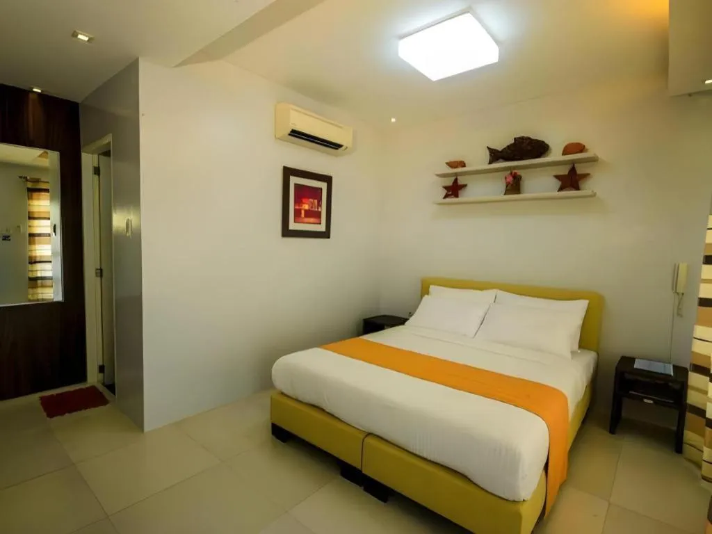 Bed in Anilao Awari Bay Resort