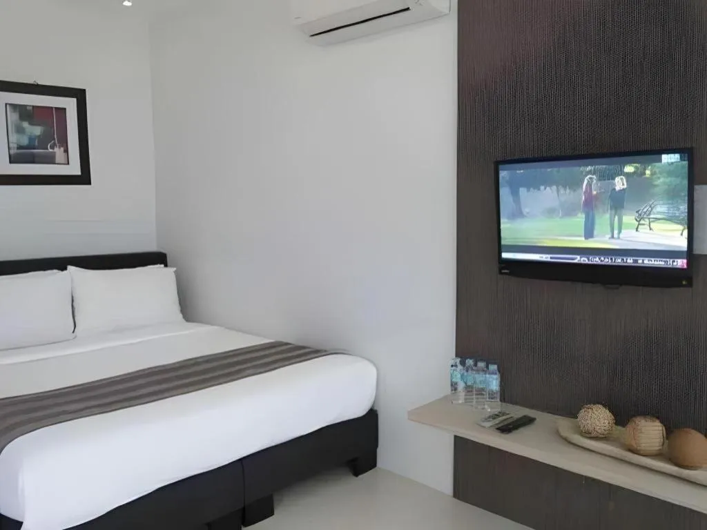 Bed in Anilao Awari Bay Resort