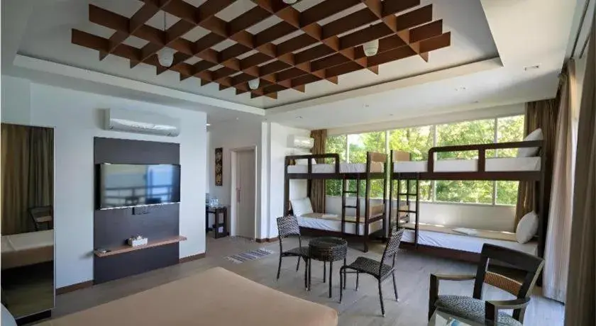 Bed in Anilao Awari Bay Resort Bed in Anilao Awari Bay Resort