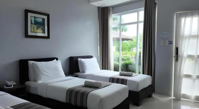 Bed in Anilao Awari Bay Resort