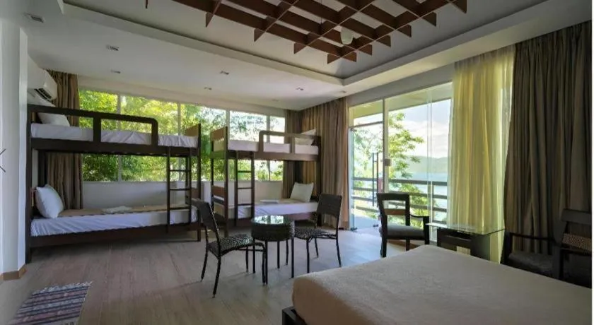 Bed in Anilao Awari Bay Resort