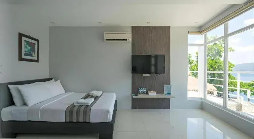 Bed in Anilao Awari Bay Resort Bed in Anilao Awari Bay Resort