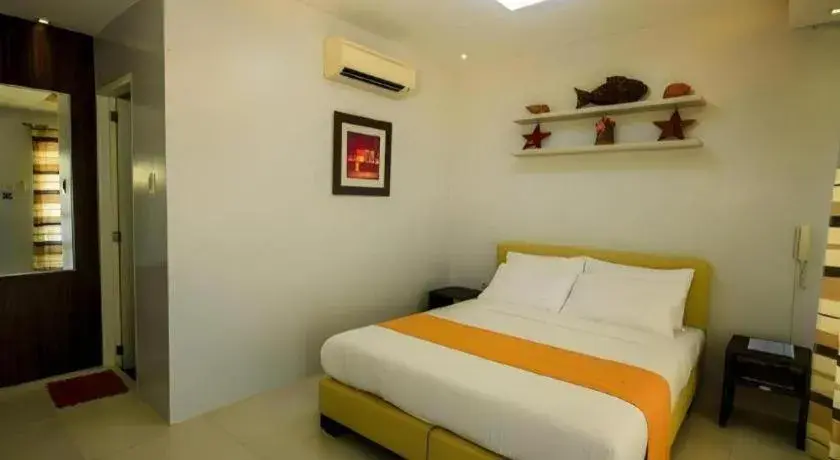 Bed in Anilao Awari Bay Resort Bed in Anilao Awari Bay Resort