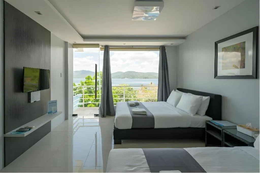 Bed in Anilao Awari Bay Resort