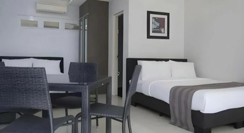 Bed in Anilao Awari Bay Resort