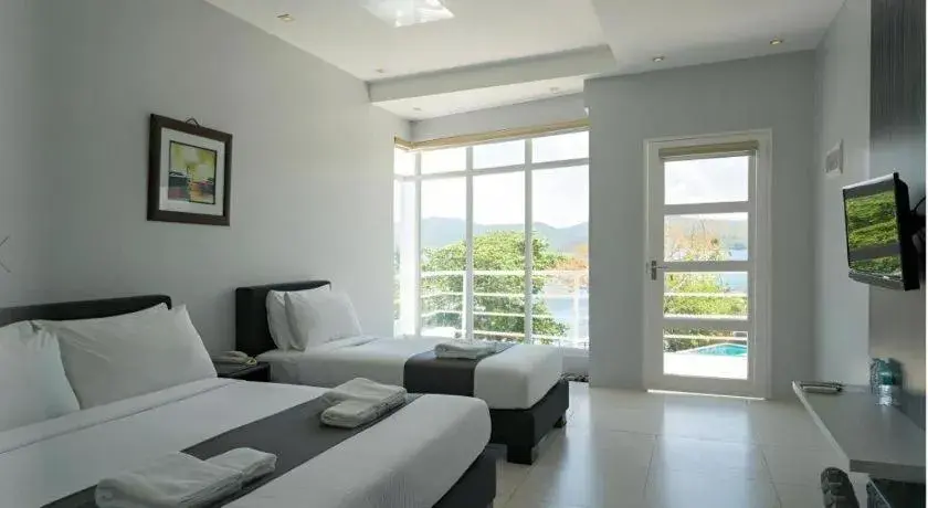 Bed in Anilao Awari Bay Resort Bed in Anilao Awari Bay Resort