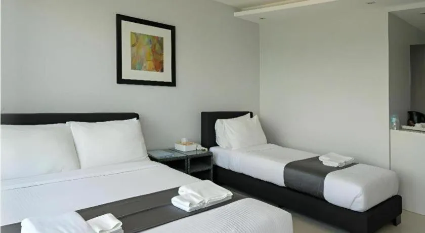 Bed in Anilao Awari Bay Resort