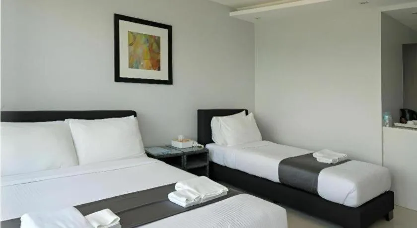 Bed in Anilao Awari Bay Resort