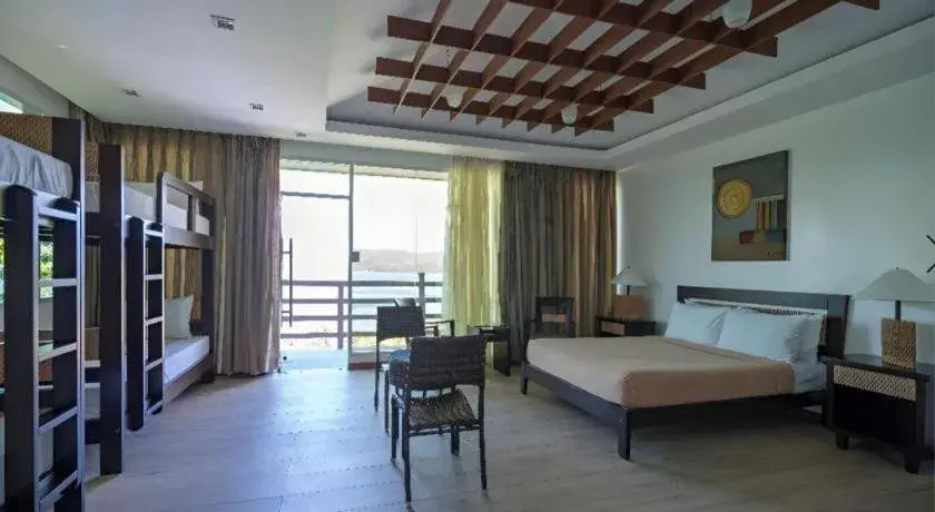 Bed in Anilao Awari Bay Resort Bed in Anilao Awari Bay Resort