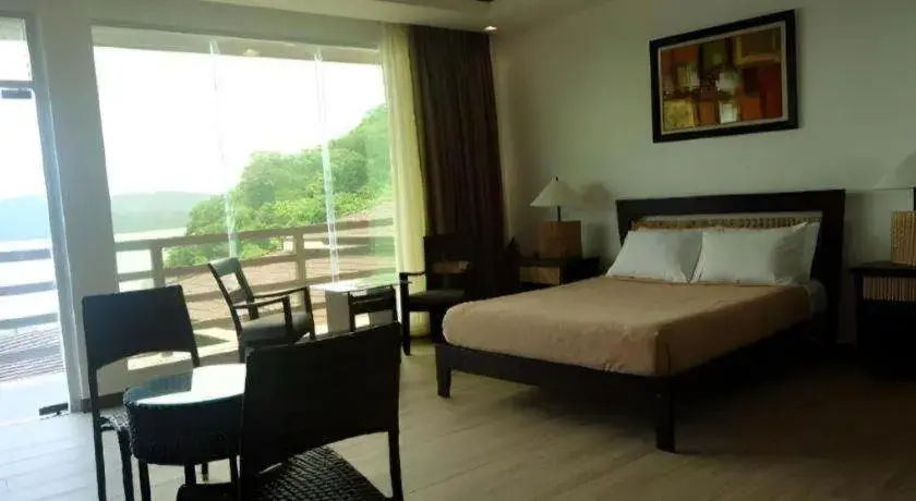 Bed in Anilao Awari Bay Resort Bed in Anilao Awari Bay Resort