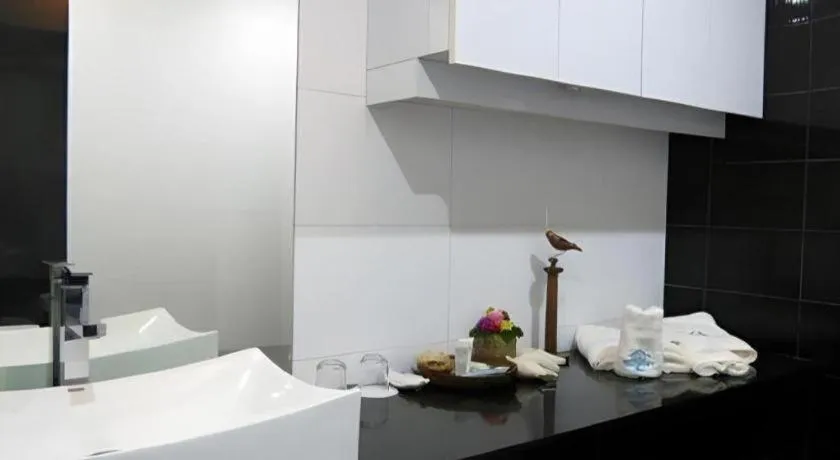 Bed in Anilao Awari Bay Resort