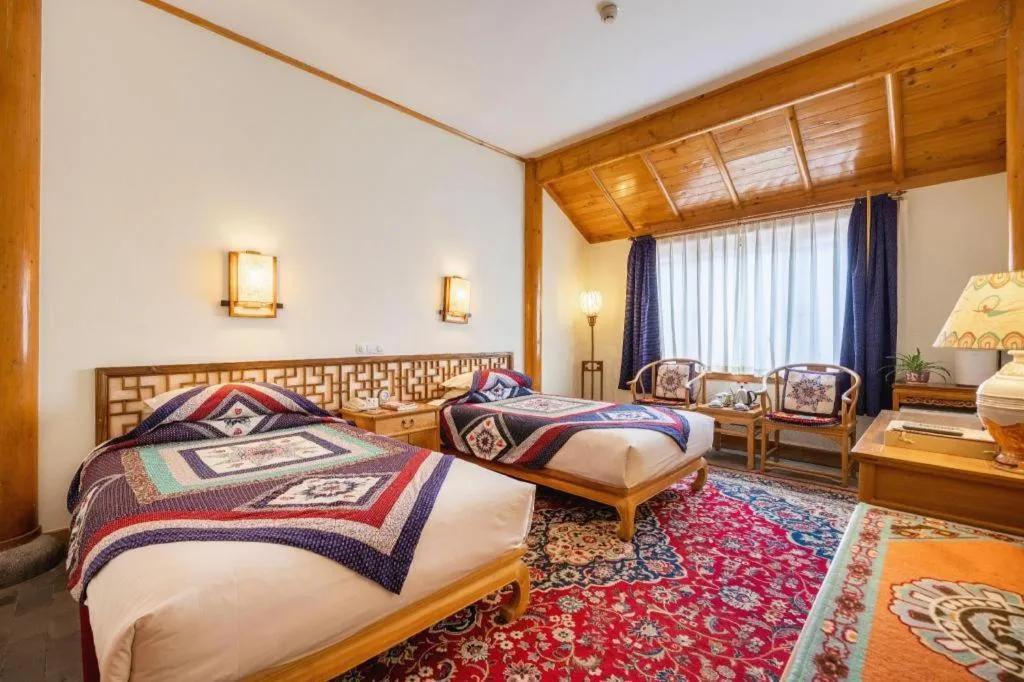 Bed in The Silk Road Dunhuang Hotel