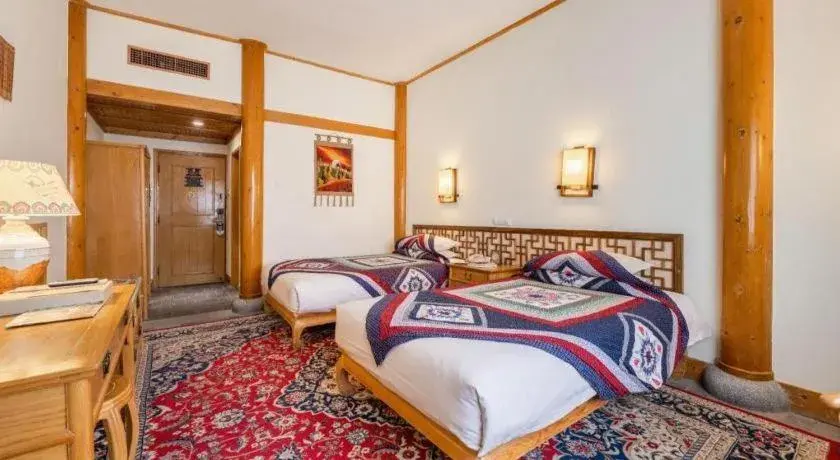 Bed in The Silk Road Dunhuang Hotel Bed in The Silk Road Dunhuang Hotel