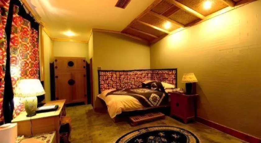 Bed in The Silk Road Dunhuang Hotel